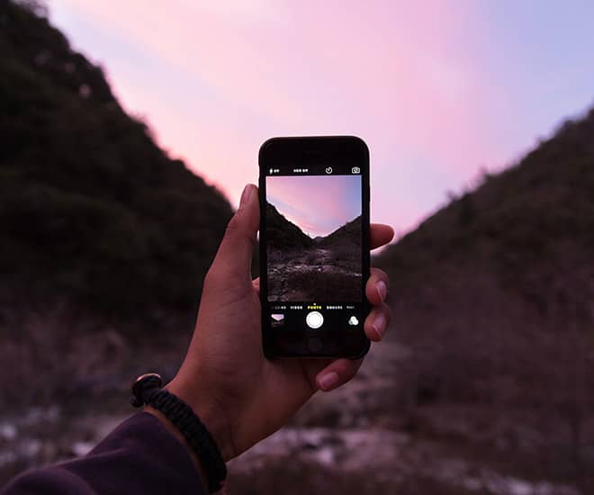 Een afbeelding om te beschrijven hoe je landschapsfoto's maakt met een mobiele telefoon